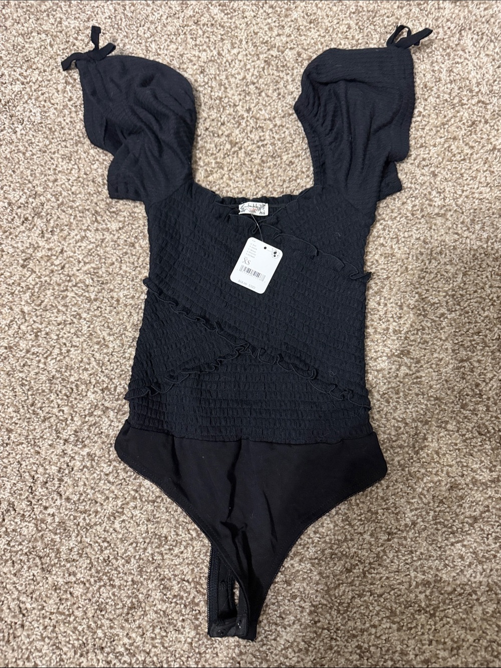 Free people nwt Black Smocked One-Piece Bodysuit for women